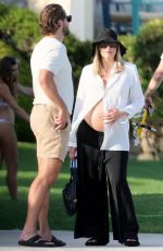 Pregnant MARGOT ROBBIE on Vacation in Sardinia 08/26/2024