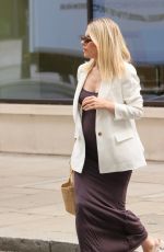 Pregnant MOLLIE KING Leaves BBC Radio One Studios in London 08/14/2024