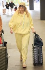 REBEL WILSON Arrives at Sydney Airport 08/04/2024