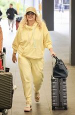 REBEL WILSON Arrives at Sydney Airport 08/04/2024