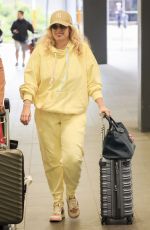 REBEL WILSON Arrives at Sydney Airport 08/04/2024