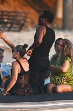RIHANNA at a Party with Friends on a Yacht in Barbados 08/07/2024
