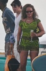 RIHANNA at a Party with Friends on a Yacht in Barbados 08/07/2024