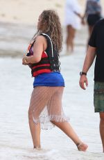 RIHANNA Out at a Beach in Barbados 08/06/2024