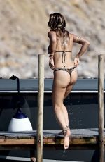 RITA ORA in  Striped Bikini at a Beach in Ibiza 08/22/2024