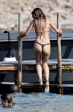 RITA ORA in  Striped Bikini at a Beach in Ibiza 08/22/2024