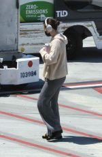 SELENA GOMEZ at LAX Airport in LOs Angeles 08/17/2024