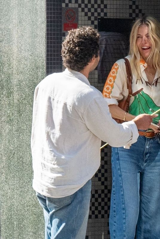 SIENNA MILLER and Oli Green Are All Loved up Inside Spanish Restaurant 08/27/2024