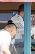 SIENNA MILLER and Oli Green Are All Loved up Inside Spanish Restaurant 08/27/2024