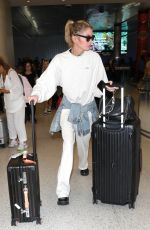 STELLA MAXWELL Arrives at LAX in Los Angeles 08/25/2024