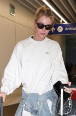 STELLA MAXWELL Arrives at LAX in Los Angeles 08/25/2024