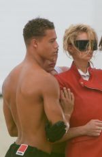 STELLA MAXWELL at a Beach Photoshoot in Miami Beach 08/29/2024