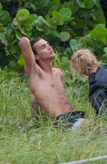 STELLA MAXWELL at a Beach Photoshoot in Miami Beach 08/29/2024