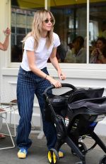 SUKI WATERHOUSE Out in London 08/20/2024