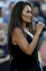 TIA CARRERE Sings National Anthem at Los Angeles Dodgers vs Baltimore Orioles Game at Dodger Stadium in Los Angeles 08/30/2024