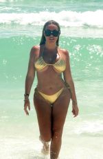 AISLEYNE HORGAN WALLACE in a Gold Bikini at a Beach in Cancun 09/10/2024