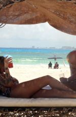AISLEYNE HORGAN WALLACE in a Gold Bikini at a Beach in Cancun 09/10/2024
