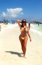 AISLEYNE HORGAN WALLACE in a Gold Bikini at a Beach in Cancun 09/10/2024