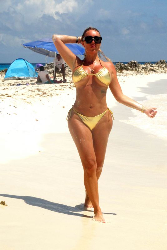 AISLEYNE HORGAN WALLACE in a Gold Bikini at a Beach in Cancun 09/10/2024