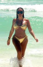 AISLEYNE HORGAN WALLACE in a Gold Bikini at a Beach in Cancun 09/10/2024