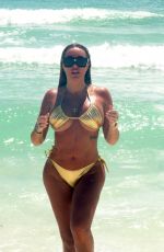 AISLEYNE HORGAN WALLACE in a Gold Bikini at a Beach in Cancun 09/10/2024