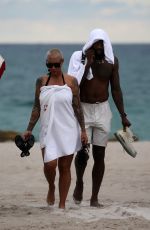 AMBER ROSE Enjoys a Beach Date in Miami 09/18/2024