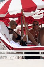 AMBER ROSE Enjoys a Beach Date in Miami 09/18/2024