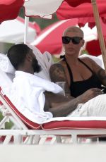 AMBER ROSE Enjoys a Beach Date in Miami 09/18/2024