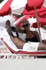 AMBER ROSE Enjoys a Beach Date in Miami 09/18/2024