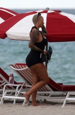 AMBER ROSE Enjoys a Beach Date in Miami 09/18/2024