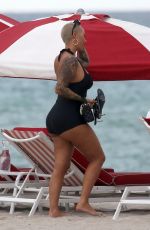 AMBER ROSE Enjoys a Beach Date in Miami 09/18/2024