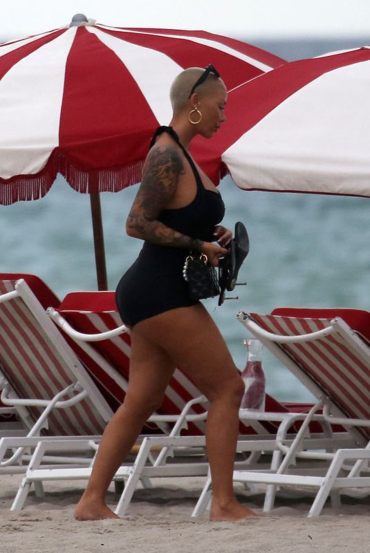 AMBER ROSE Enjoys a Beach Date in Miami 09/18/2024