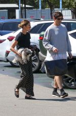 ASHLEY BENSON and Brandon Davis Out with Their Dog in Studio City 09/16/2024