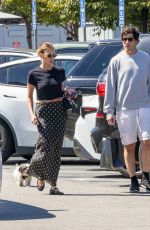 ASHLEY BENSON and Brandon Davis Out with Their Dog in Studio City 09/16/2024