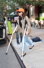 AUBREY PLAZA on Crutches After Suffering Torn ACL at WNBA All-Star Weekend in New York 09/09/2024