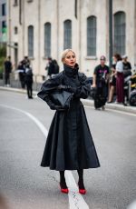 CAROLINE DAUR Arrives at Prada Fashion Show at Milan Fashion Week 09/19/2024