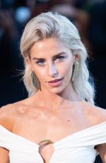 CAROLINE DAUR Arrives at Schiaparelli Fashion Show at Paris Faashion Week 09/26/2024