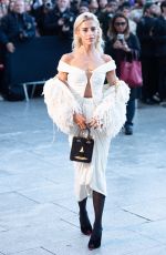 CAROLINE DAUR Arrives at Schiaparelli Fashion Show at Paris Faashion Week 09/26/2024