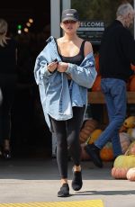 CHRISSY TEIGEN Shopping for Groceries at Bristol Farms in Los Angeles 09/20/2024