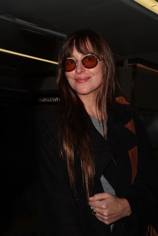DAKOTA JOHNSON Arrives for Milan Fashion Week 09/19/2024