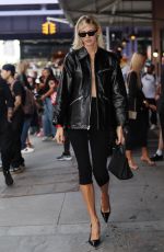 DEVON WINDSOR Arrives at Alexander Wang Fashion Show in New York 09/08/2024