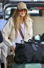 ELLE MACPHERSON Leaves Australia 09/10/2024