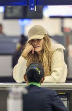ELLE MACPHERSON Leaves Australia 09/10/2024
