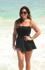 EMILY SIMPSON Poses on the Beach in Cancun 09/01/2024