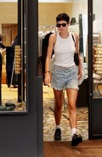 EMMA CORRIN in Denim Shorts Shopping at Bottega Veneta in Venice 08/31/2024