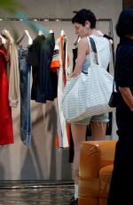 EMMA CORRIN in Denim Shorts Shopping at Bottega Veneta in Venice 08/31/2024