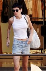 EMMA CORRIN in Denim Shorts Shopping at Bottega Veneta in Venice 08/31/2024