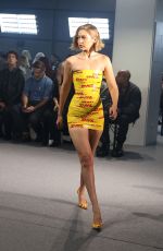 GIGI HADID in DHL Packing Tape Walks Vetements Runway Show in Paris 09/28/2024