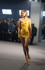 GIGI HADID in DHL Packing Tape Walks Vetements Runway Show in Paris 09/28/2024