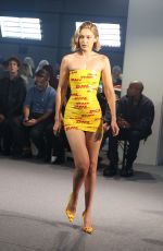 GIGI HADID in DHL Packing Tape Walks Vetements Runway Show in Paris 09/28/2024